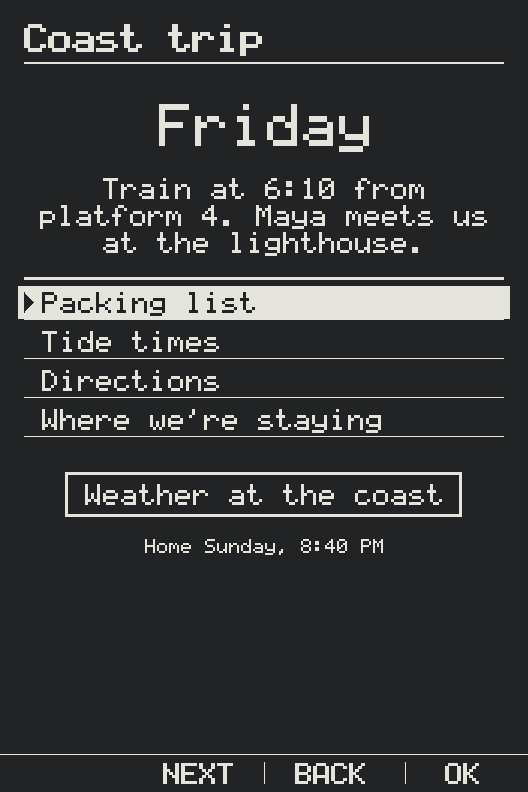 A graphite X3 in dark mode, showing a screen Sam built: Coast trip. Friday. “Train at 6:10 from platform 4. Maya meets us at the lighthouse.” Then Packing list, Tide times, Directions, Where we’re staying, a button for the weather at the coast, and “Home Sunday, 8:40 PM.”